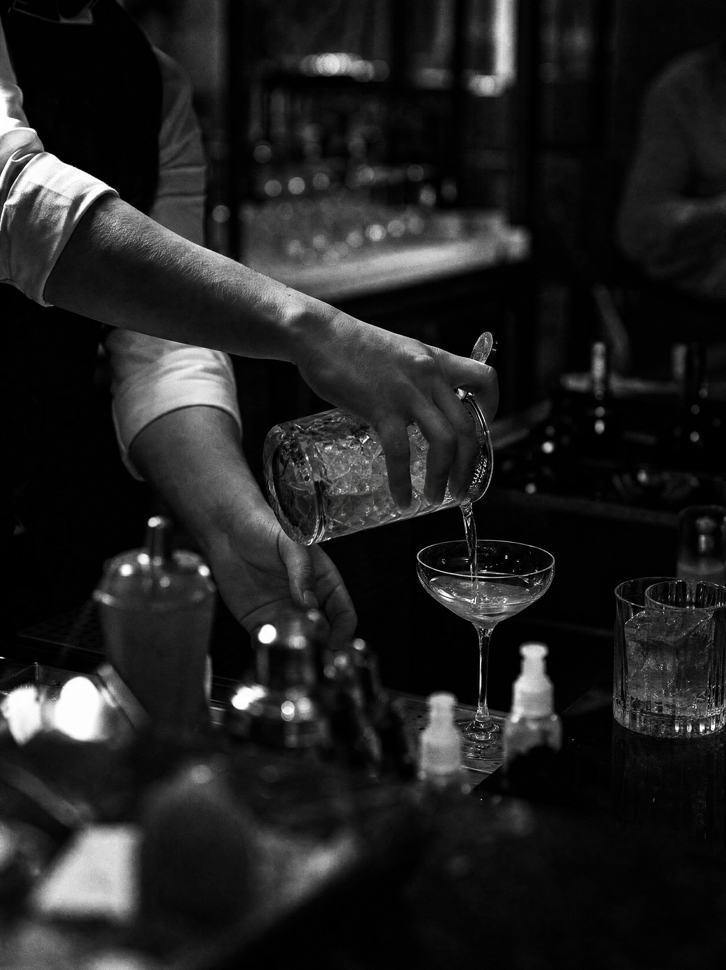 A bartender at work behind the bar